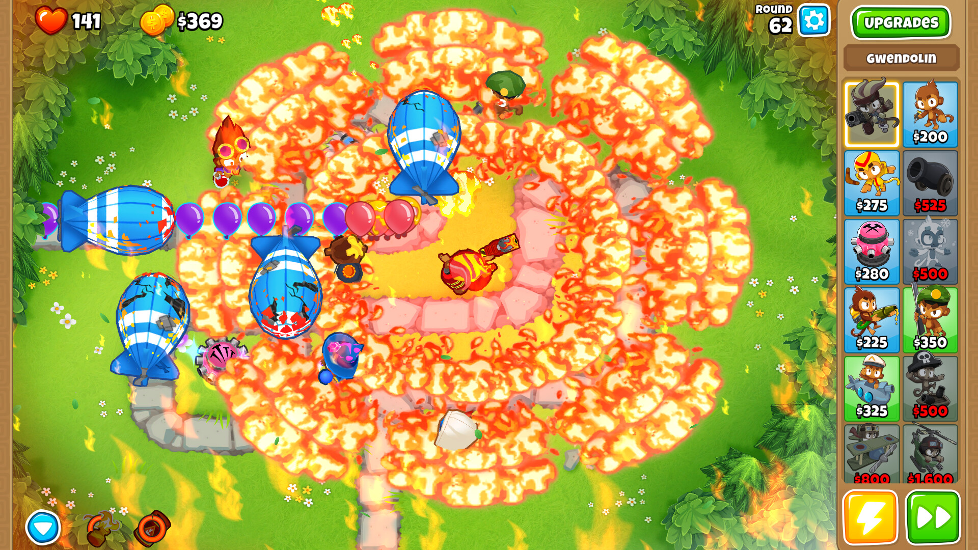 Bloons TD 6 mid-game MOAB blimps meeting a fire defense